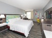 1 King bed, flat-screen TV, work desk at Hampton Inn Saint Augustine Beach, FL.