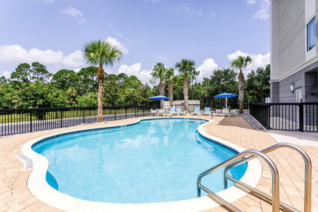 Outdoor pool on property.