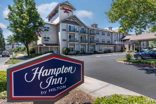 Beautifully landscaped hotel exterior.