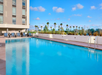 Enjoy a sunny day by the outdoor pool.