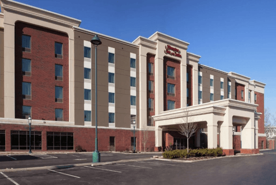 The front and entrance to the Hampton Inn and Suites Pittsburgh Waterfront