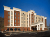 The front exterior and entrance to the Hampton Inn and Suites Pittsburgh Waterfront
