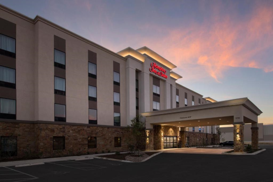 Entrance to the hotel with the hotel sign.