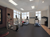 Fitness facility with cardio equipment.