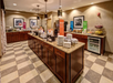 Start your day in the inviting breakfast area, offering a variety of delicious options.