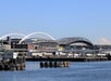 The view of the stadium with Mount Rainier in the background from the water on Harbor Cruise Seattle Washington.