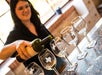 Pouring wine at Hill Country BBQ & Wine Shuttle in Austin, TX