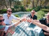 A group doing a "cheers" on the Hill Country tour in Austin, TX