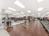 Spacious fitness facility with treadmills and other equipment.