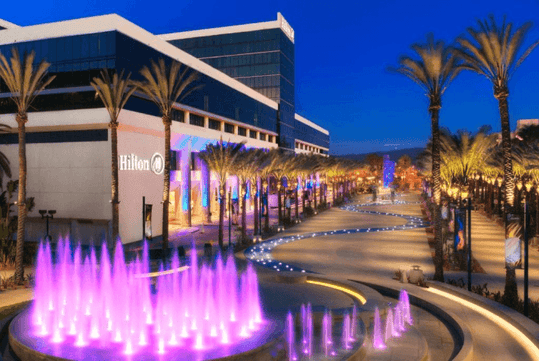 Hotel exterior at night.