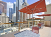 Relax at the rooftop terrace with city view.