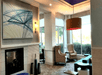 Lobby area with TV and fireplace at Hilton Garden Inn Cincinnati Blue Ash, OH.