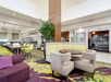 Spacious lobby area offering a warm welcome and comfortable seating for guests.
