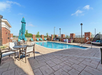 Refreshing outdoor pool, perfect for a leisurely swim or relaxing in the sun.