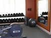 Fitness room with different gym equipment.
