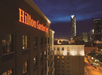 Hotel exterior under the night sky.