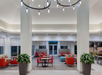 Hotel lobby with ample seating.