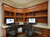 Business center equipped with desktop computers.