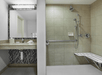 Accessible shower inside a private bathroom.