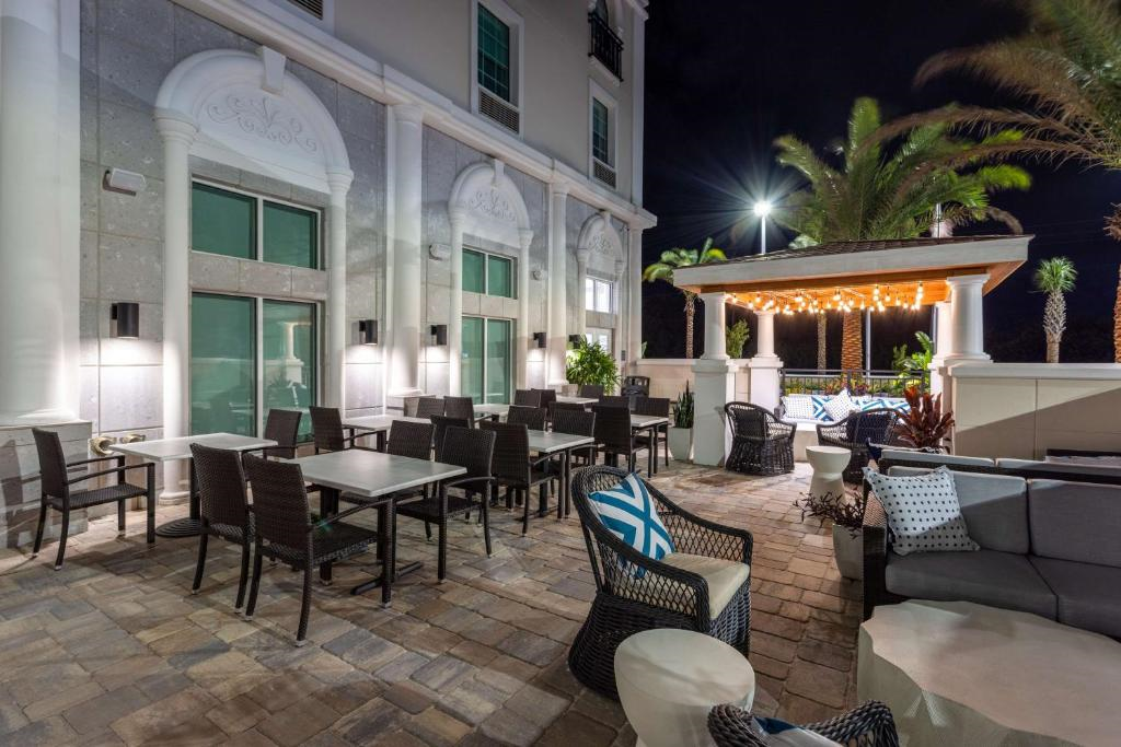 The outdoor dining area offers a relaxed setting for al fresco dining.