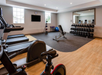 The fitness center offers modern equipment for a complete workout experience.