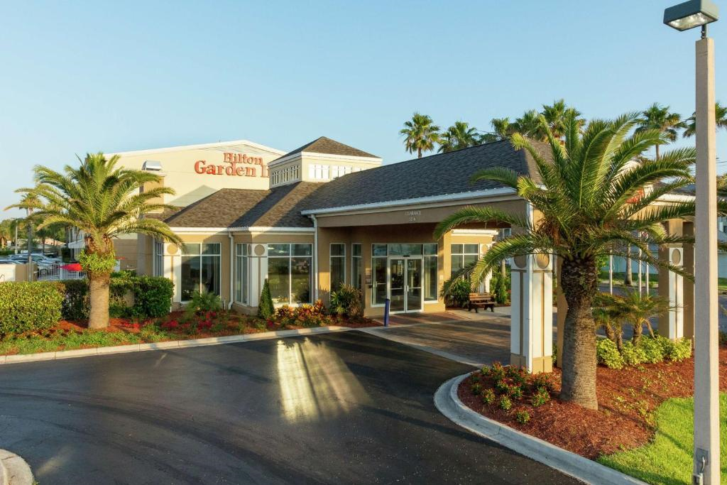 Beautifully landscaped hotel exterior.