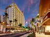 Hotel exterior at night.