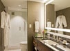 Luxurious private bathroom with fresh towels, bathrobe and complimentary toiletries.