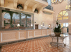 A spacious and bright lobby/reception area.