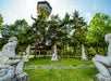 Some statues with a view of Inspiration Tower