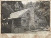 A historic photograph of Old Matt's Cabin