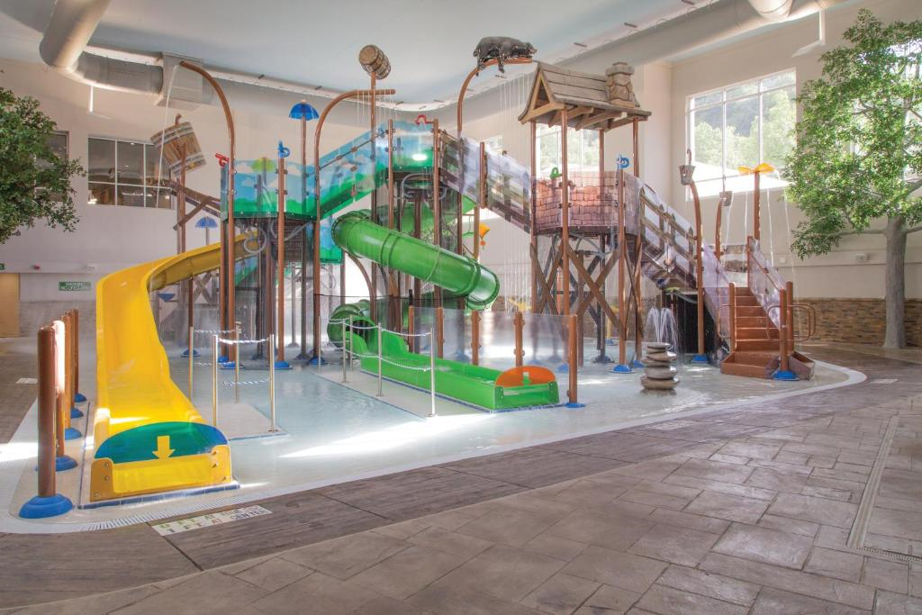 Splash zones with waterslides for kids.