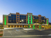 Hotel exterior with parking space.