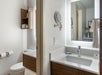 Most rooms feature a bathroom with a double vanity to accommodate multiple guests.