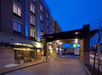 Exquisite hotel exterior at night.