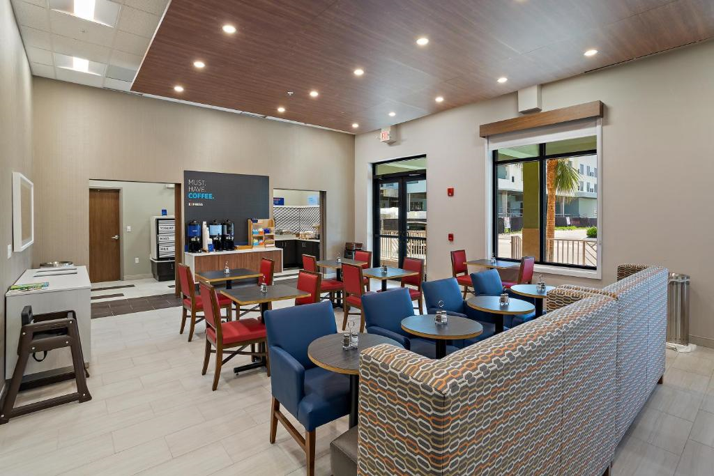 Start the day right in the inviting breakfast area, offering a bright and welcoming space to dine.