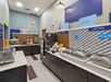 The breakfast area provides a comfortable setting to enjoy your morning meal.
