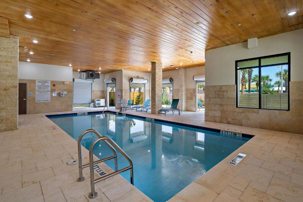 The indoor pool offers a relaxing environment, perfect for a leisurely dip.