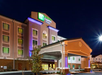 Exterior view of the hotel at night.