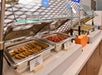 Bacon, sausages, and more at the breakfast bar.