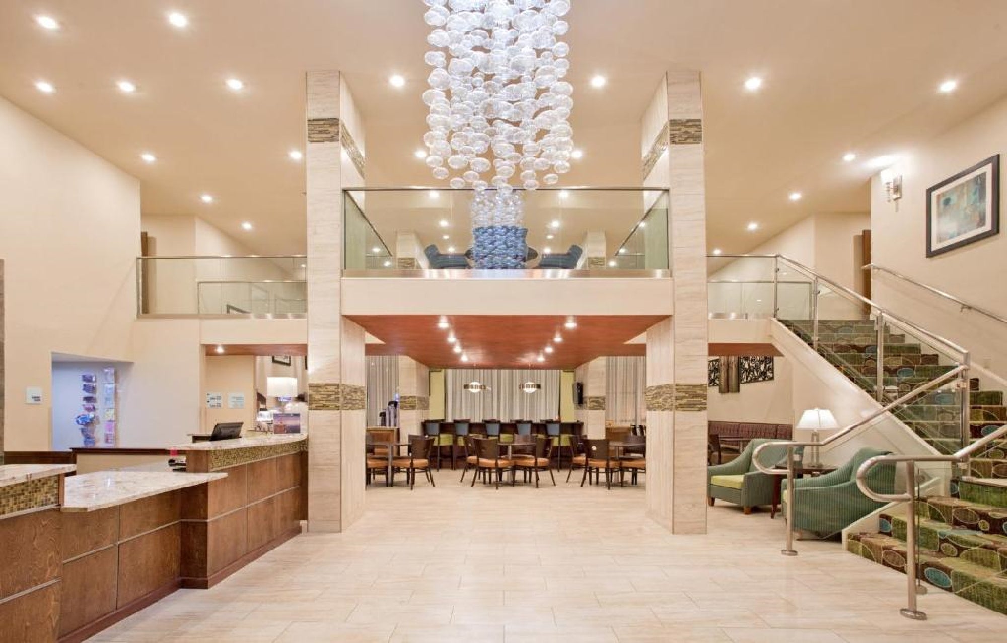 Hotel lobby, registration desk and dining area in the back.