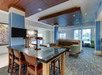 Lounge on the soft seating or get work done at the table with a lamp in the lobby.