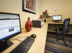 Business center with two desktop computers.