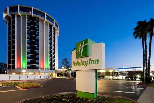 Exterior view of the hotel with signage.
