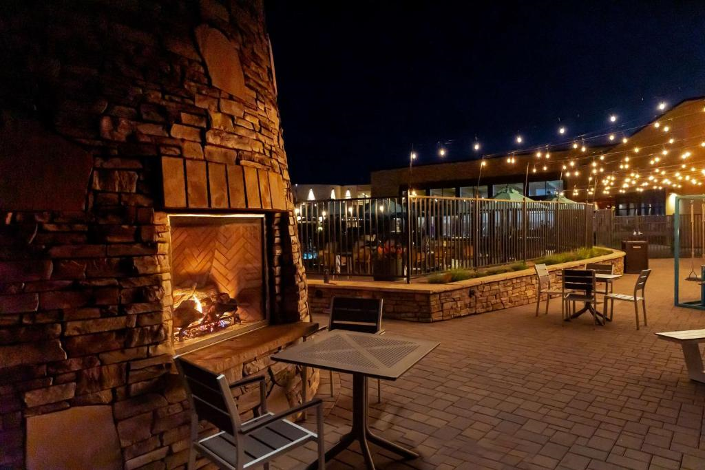 The fire pit area offers a warm and inviting outdoor retreat.