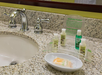 Complimentary toiletries inside a private bathroom.