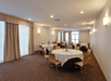 Meeting facility with round tables set-up.