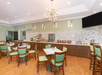 Dining area at Holiday Inn & Suites Boca Raton North..