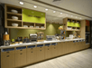 Breakfast area with a variety of breakfast items, microwave, and more.