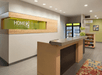Front desk with snack bar on the side.